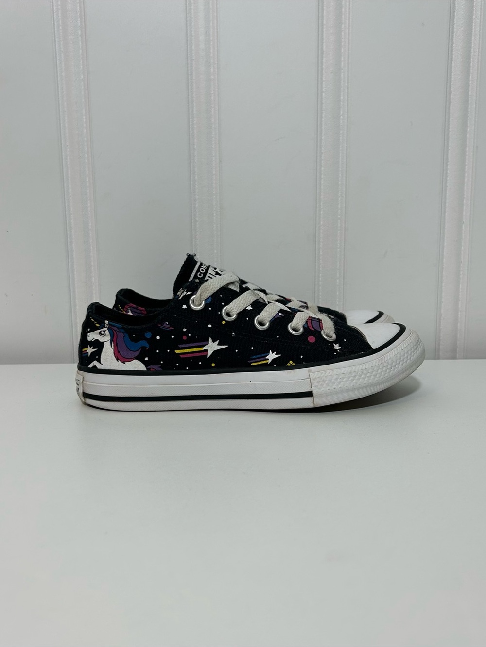 Converse ctas low black unicorn space
Stars